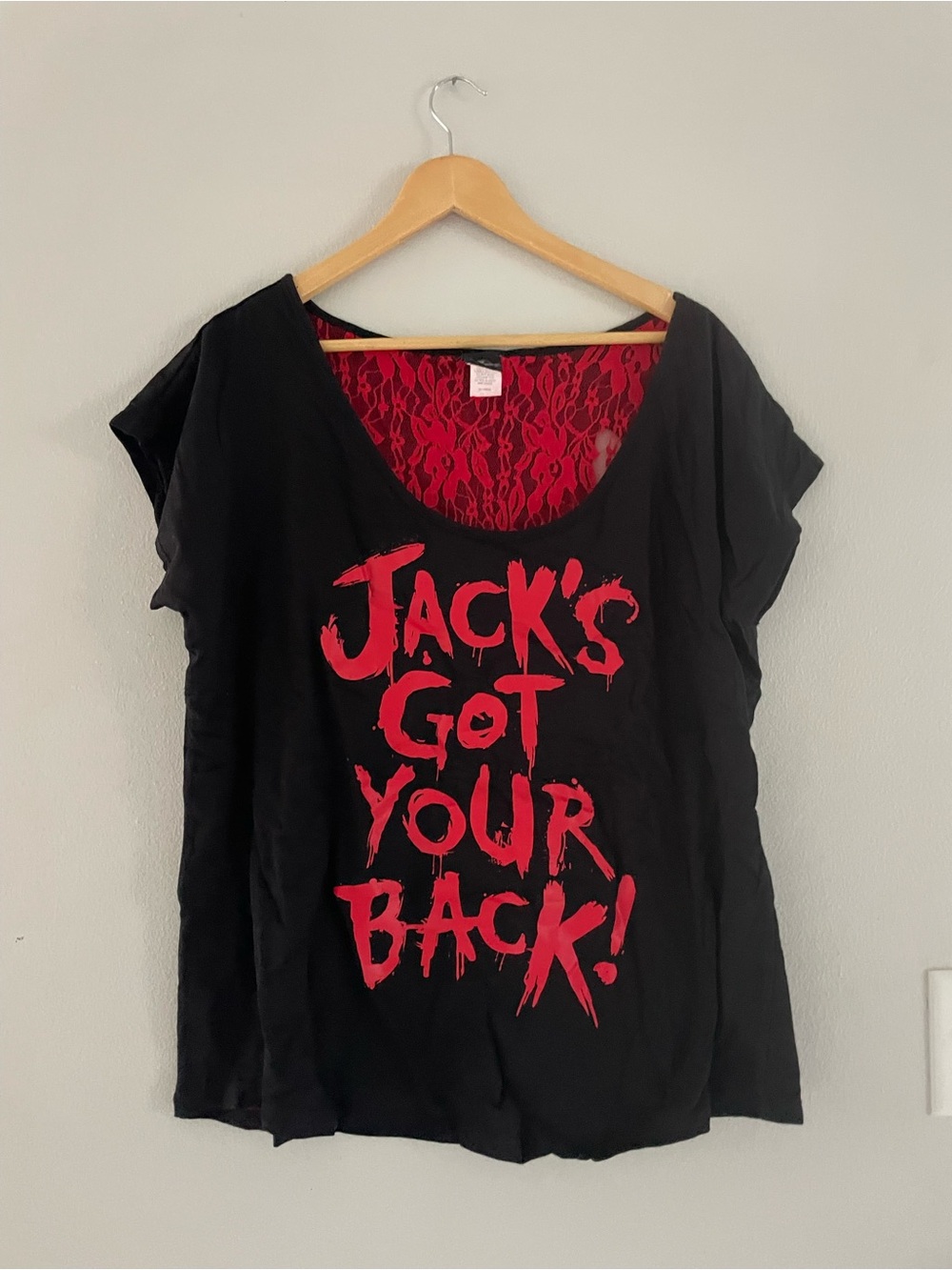 Universal Black Scoop Neck Tee with Red Graphic